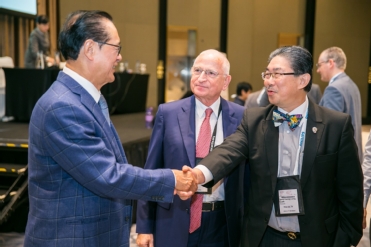 ESC-Asia-APSC-AFC-2019-speakers-talking-shaking-hands-singapore.jpg